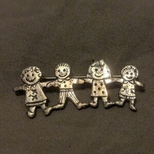 Vintage brooch with children